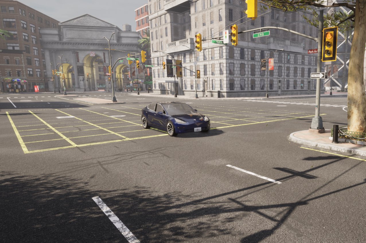 CARLAの3Dの街。信号のある交差点に青い車が止まっている